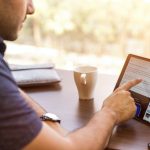 man holding tablet computer